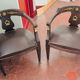 Pair of Empire armchairs in bronze and mahogany.