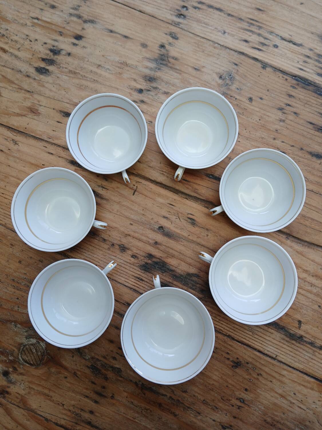 Set of 7 Limoges porcelain cups and saucers