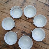 Set of 7 Limoges porcelain cups and saucers