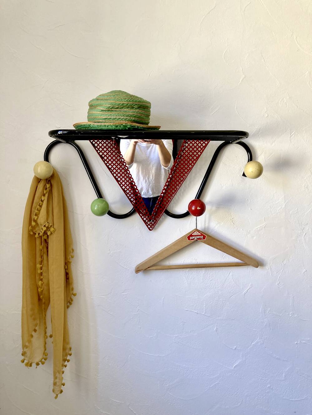 Wall coat rack, 1950s, attributed to Mathieu Matégot.