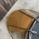 1 Linda armchair chair by Arrben in camel brown leather with a chrome steel frame.