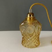 Bladeuse tulipe vintage en verre ambré