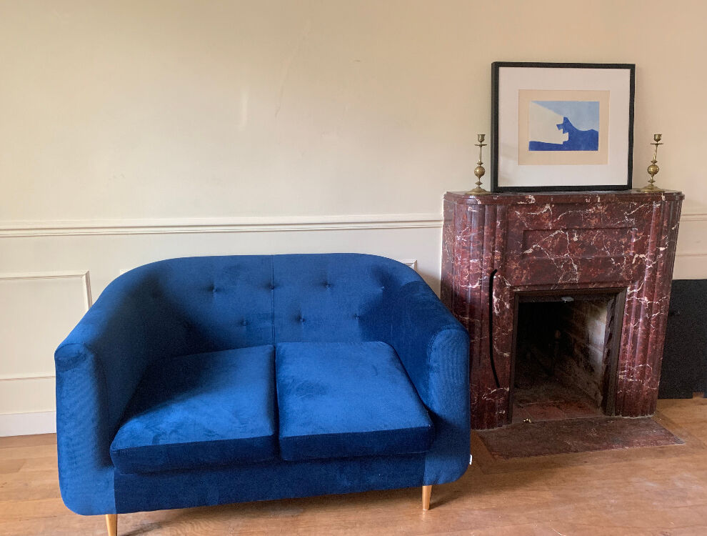 Blue velvet sofa