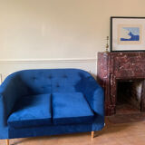 Blue velvet sofa