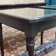 English nesting tables in mahogany and leather top under glass - work from the 1950s