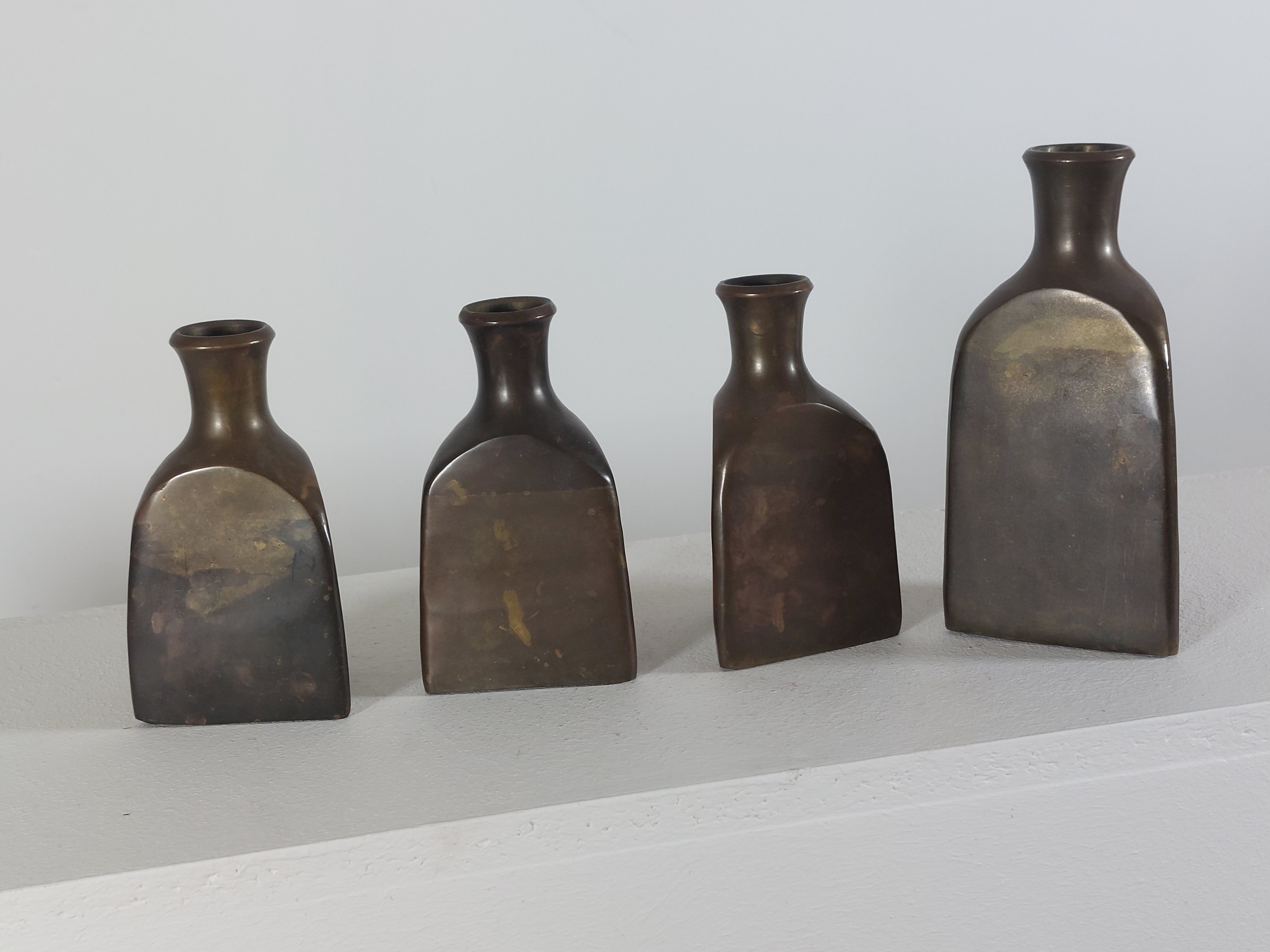Vintage mid century Set of four triangular brass vases