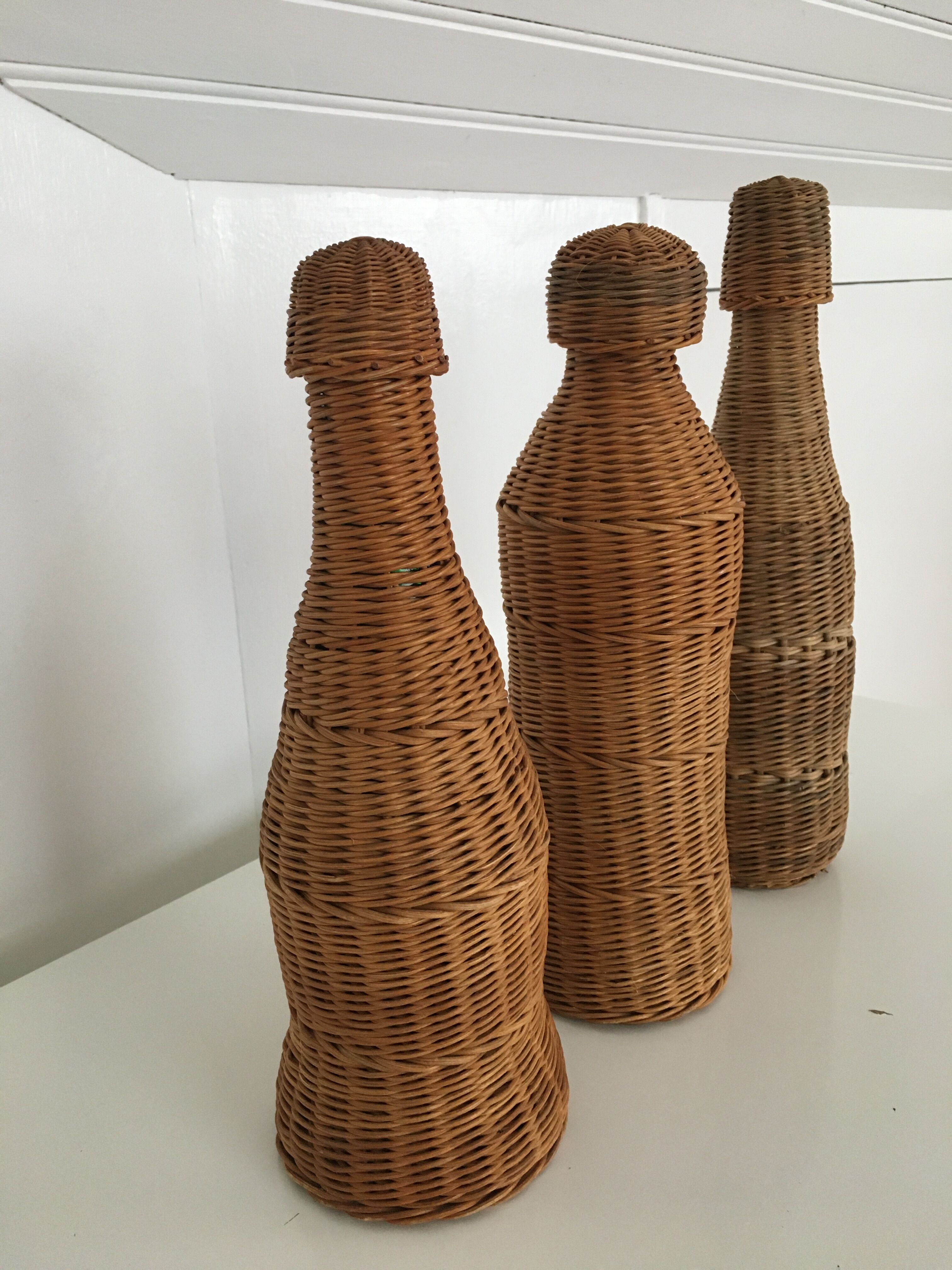 Set of 3 rattan bottles