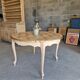 Round table made of cherry wood, sanded and varnished.
