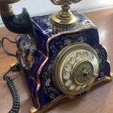 Téléphone de maison en porcelaine doré début XXeme