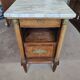 Antique Empire-style bedside table with marble top.