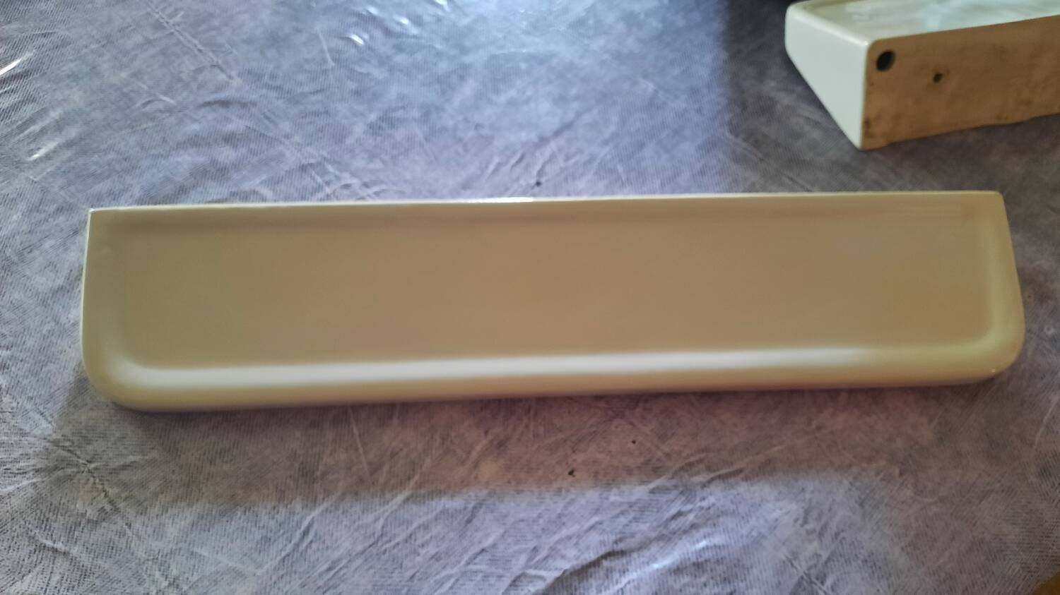 Porcelain bathroom shelf