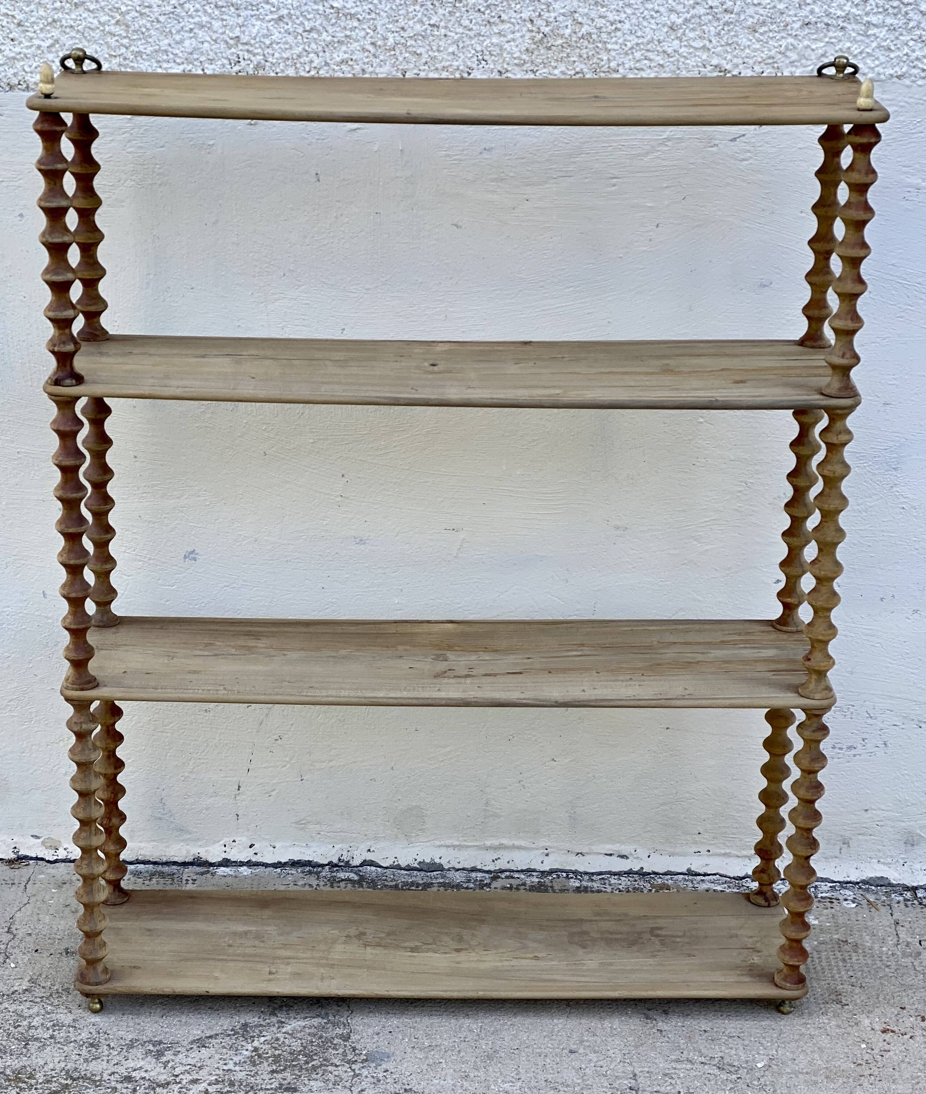 Large 19th-century turned wood wall shelf, stripped.