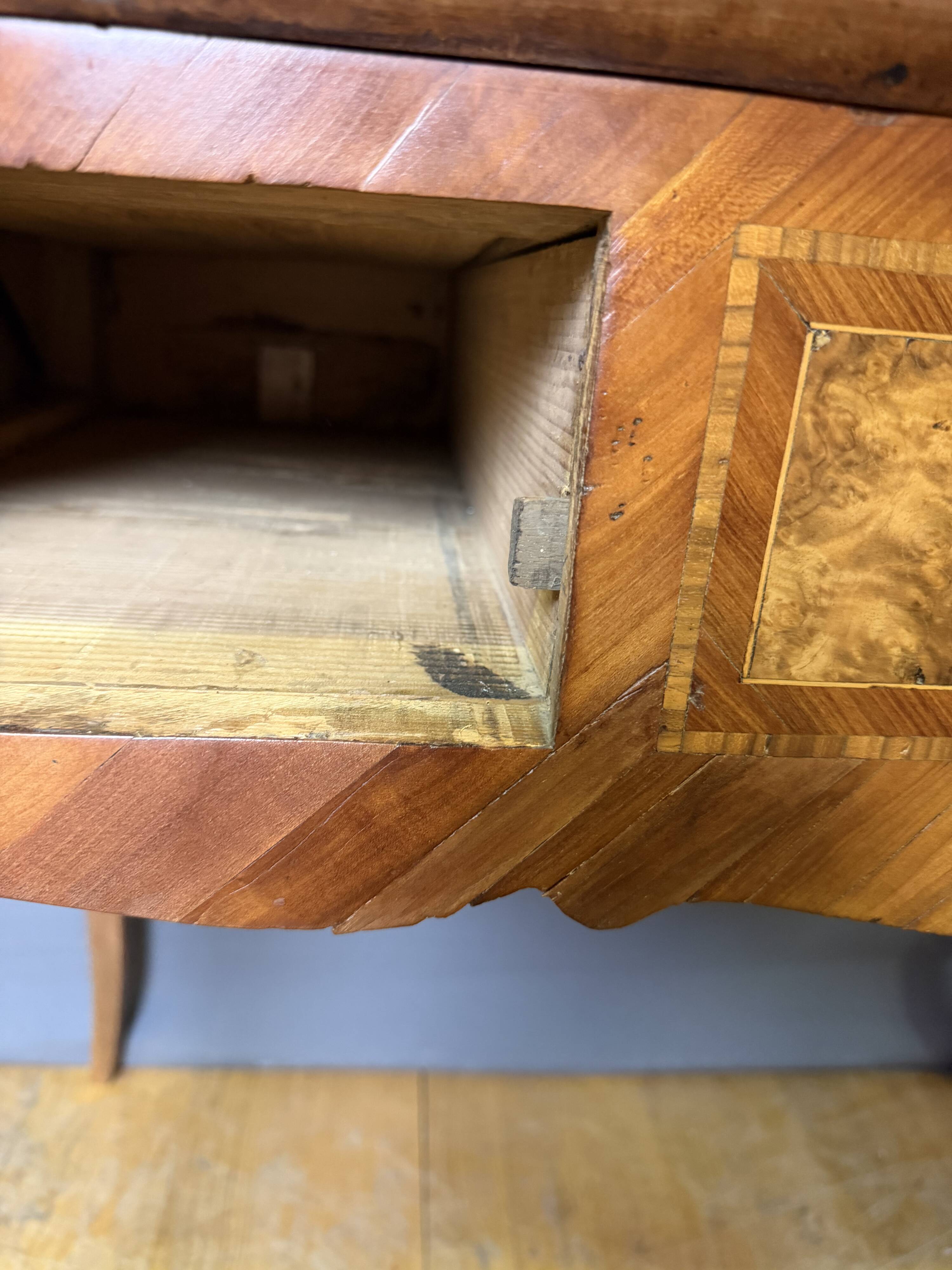 Louis XV slant-top desk in 18th-century marquetry.