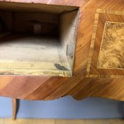 Louis XV slant-top desk in 18th-century marquetry.