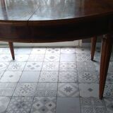 Oval table with medallion in mahogany speckled mahogany Louis XVI