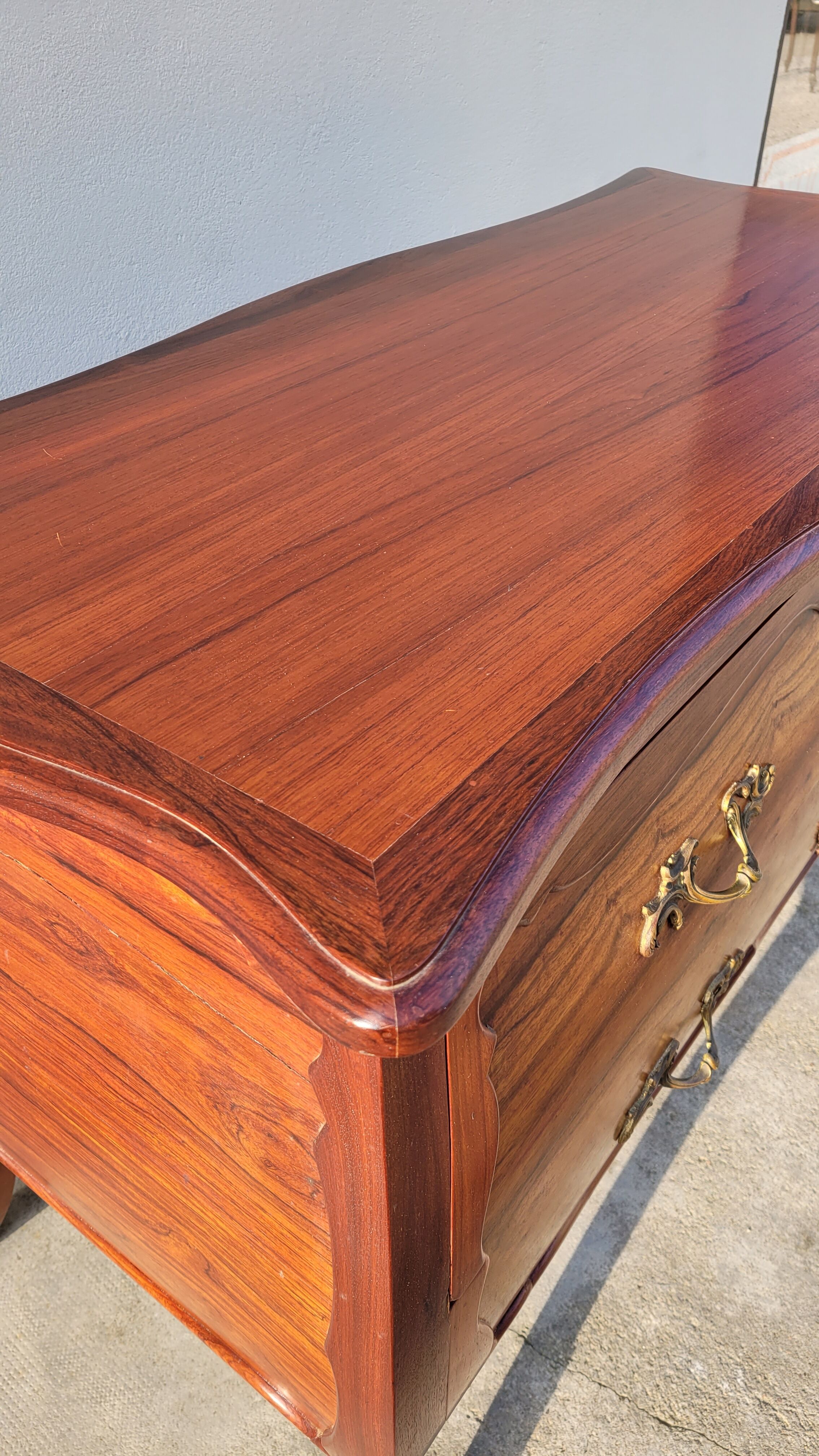 Curved Louis XV style commode in mahogany.