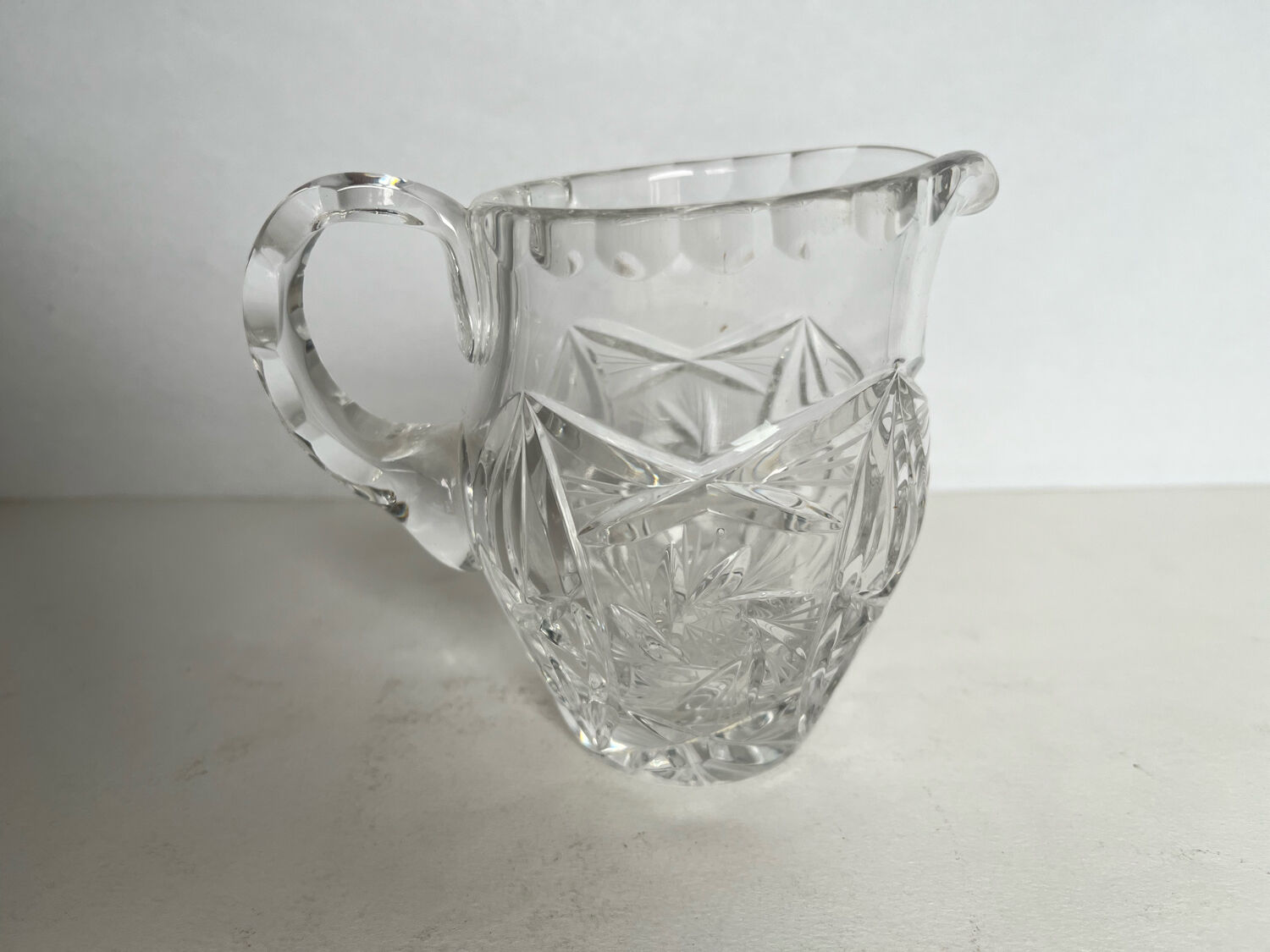 2 crystal pitchers