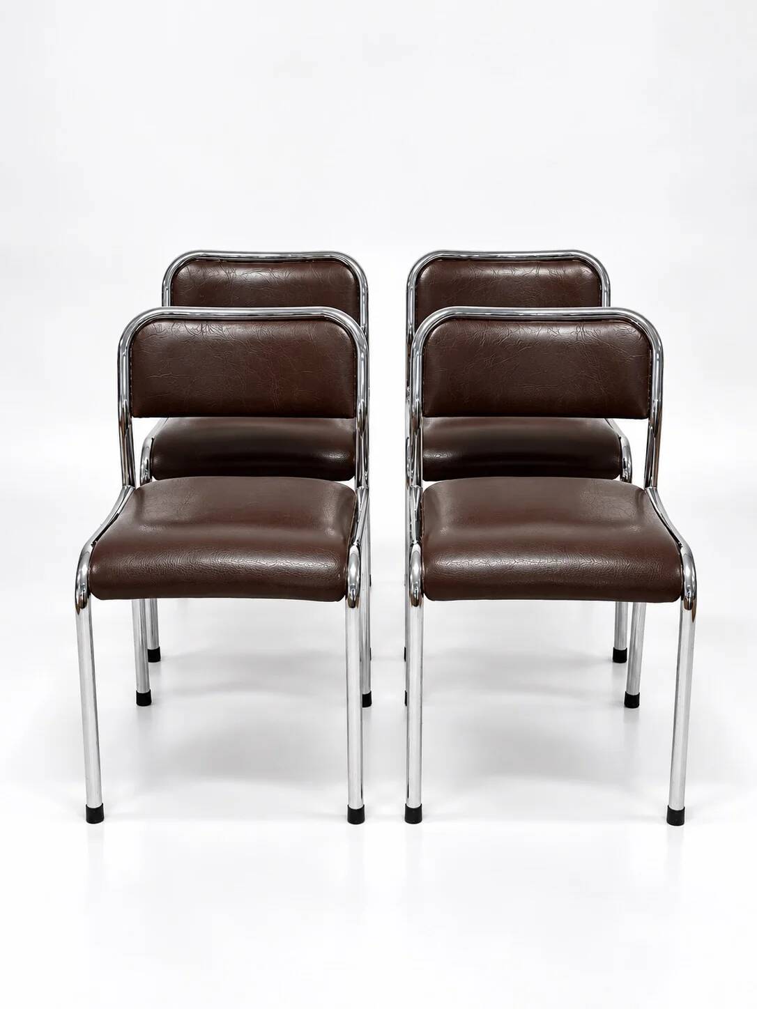 Set of 4 vintage dining chairs in chrome, brown faux leather, 1970s.