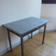 Metal kitchen table with gray speckled enameled top from the 1940s