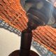 Lampe en bois sculpté figurant une fleur, années 60