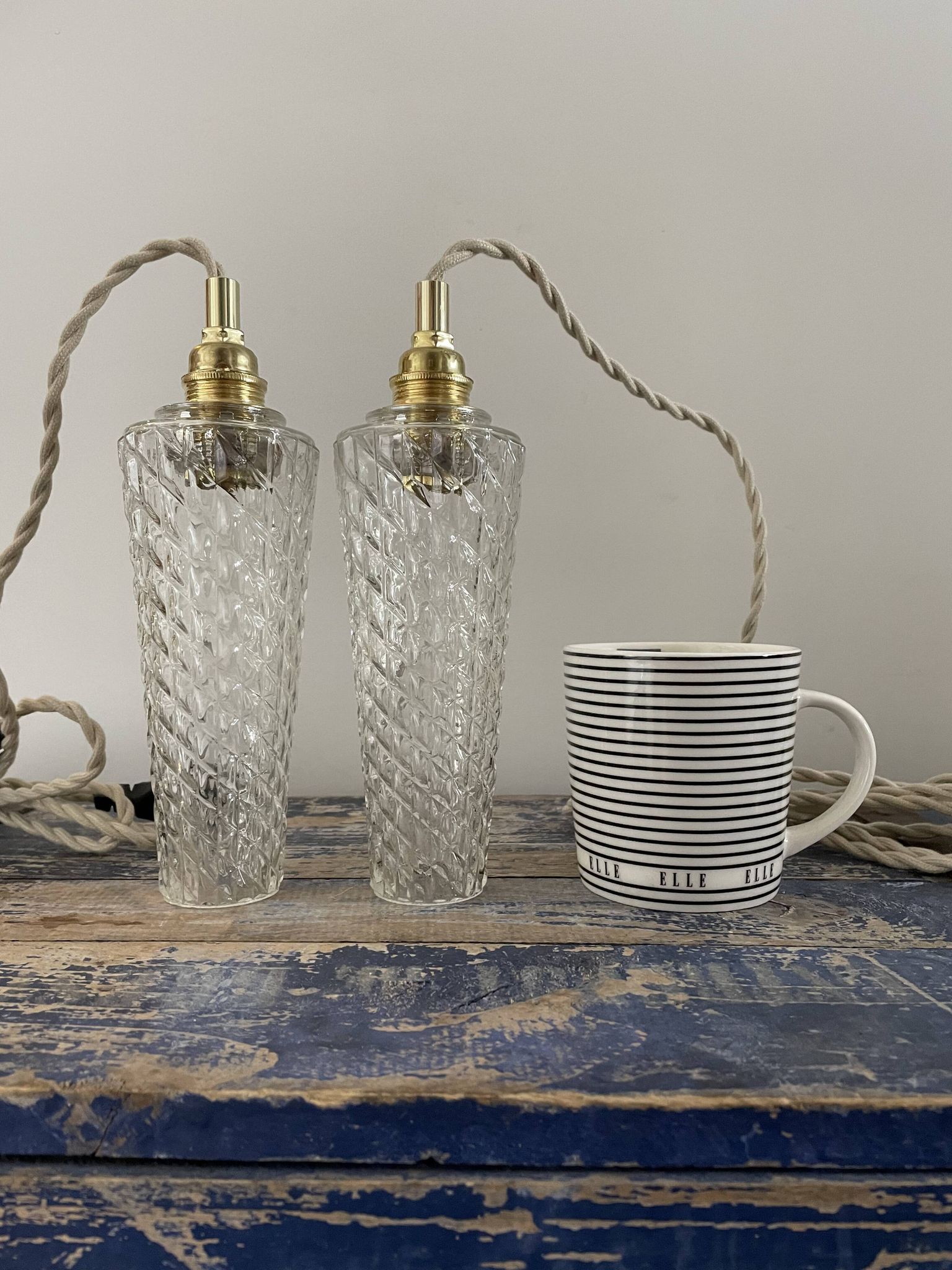 Set of two vintage electric chiseled glass walking lamps