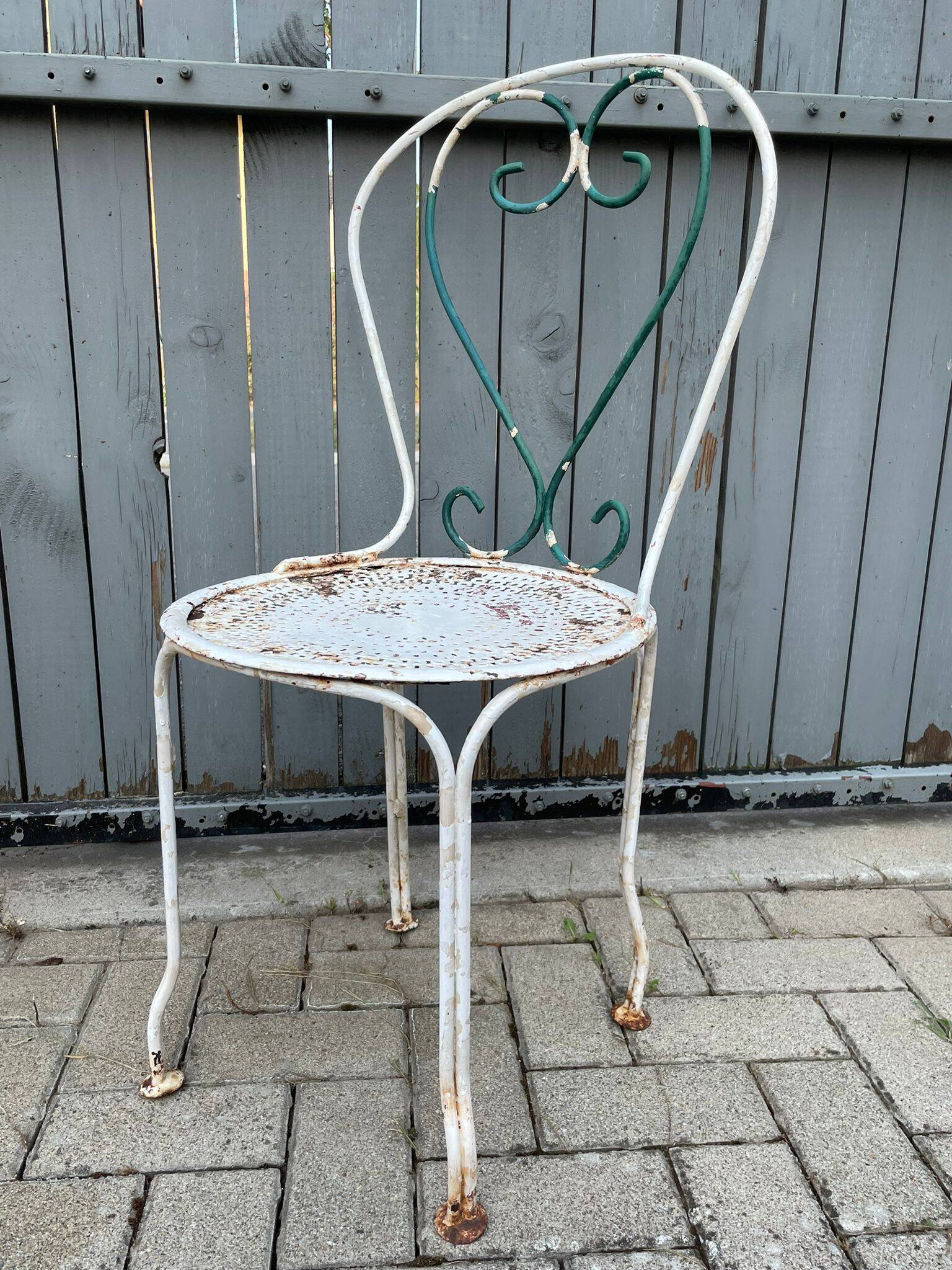 pair of antique wrought iron garden chairs