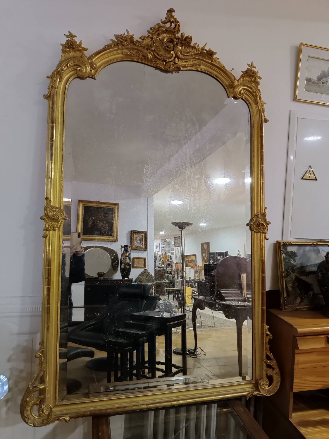 Large 19th century mirror gilded with gold leaf