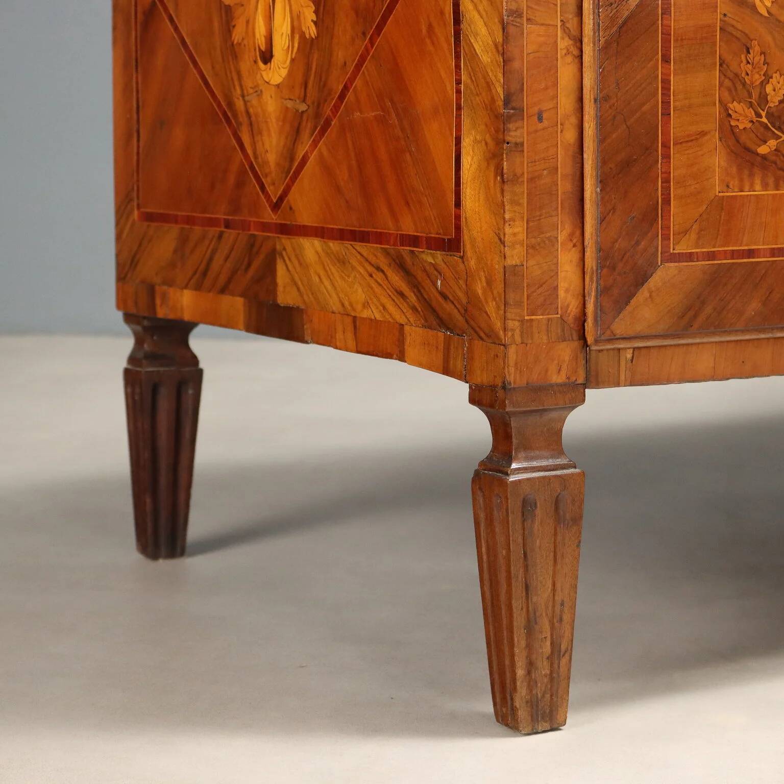 Pair of antique neoclassical walnut commodes from the 18th century.