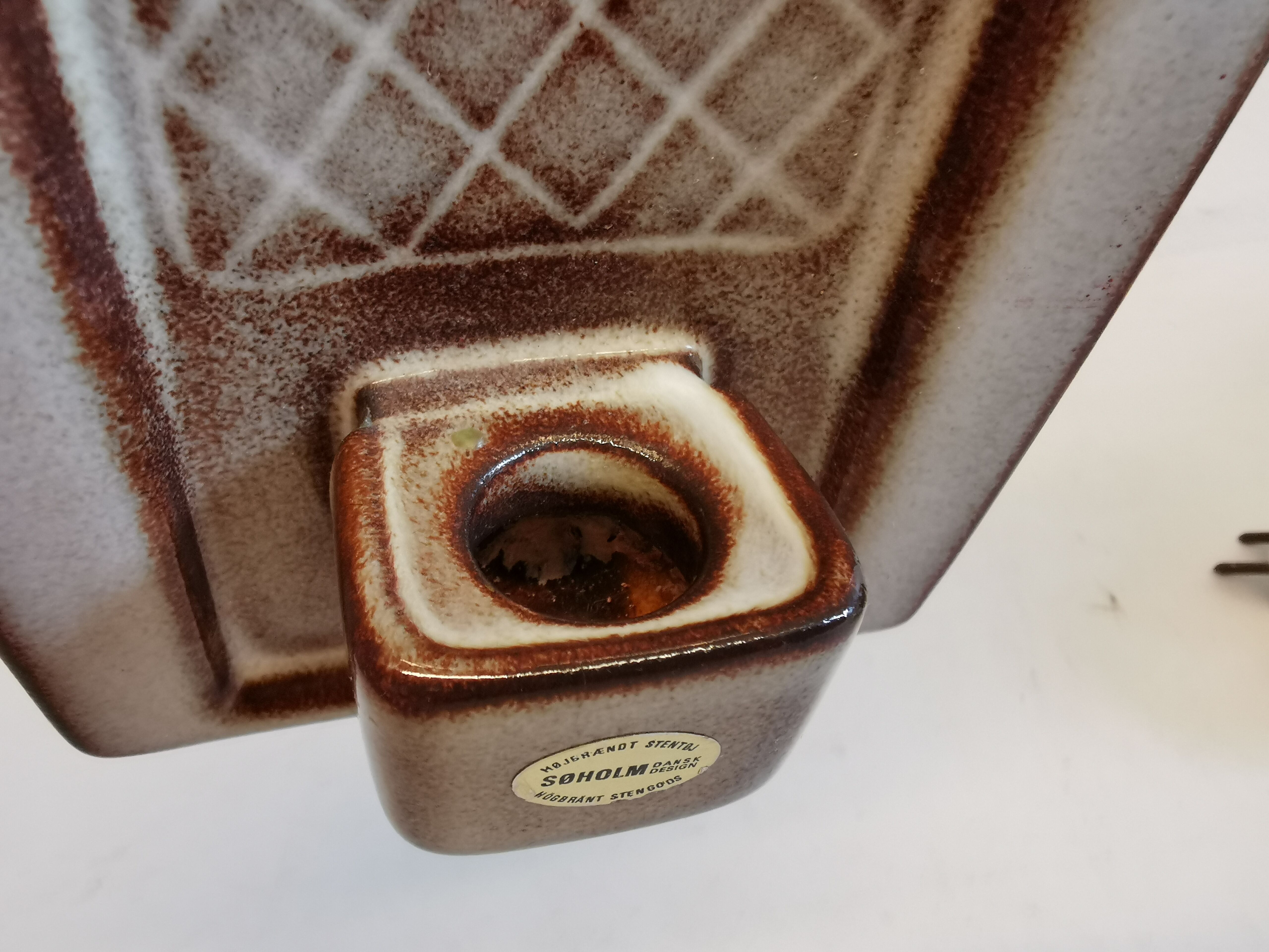 Wall-hung candle holder in ceramic, from Danske Søholm, estimated 1960s.