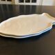 two Revol fish dishes