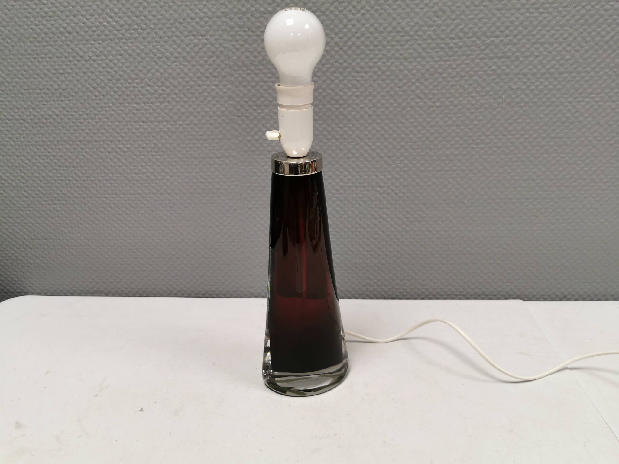 Table lamp by Carl Fagerlund for Orrefors Glassworks Sweden 1960s in translucent and deep red glass.