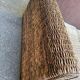 Exotic 2-seater sofa in woven banana tree / rattan and brown fabric.