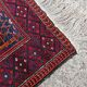 Vintage hand-knotted Persian Baluch prayer rug from the 1940s.