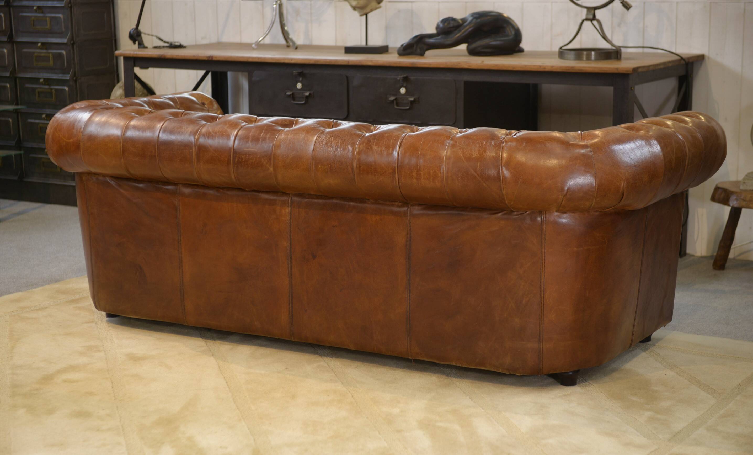 Brown leather Chesterfield sofa