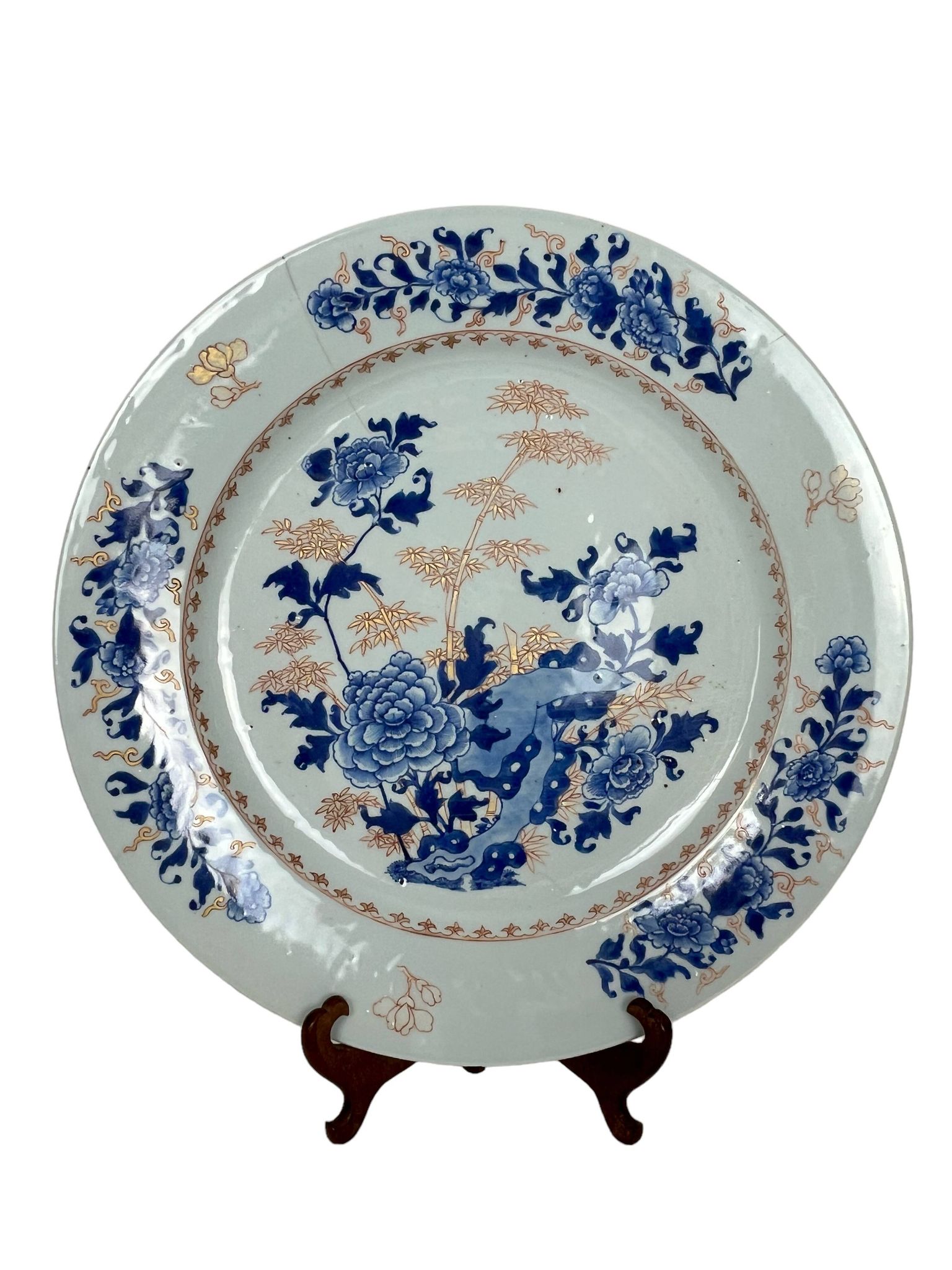 Japan, Imari porcelain plate with bamboo and peonies, 19th century.