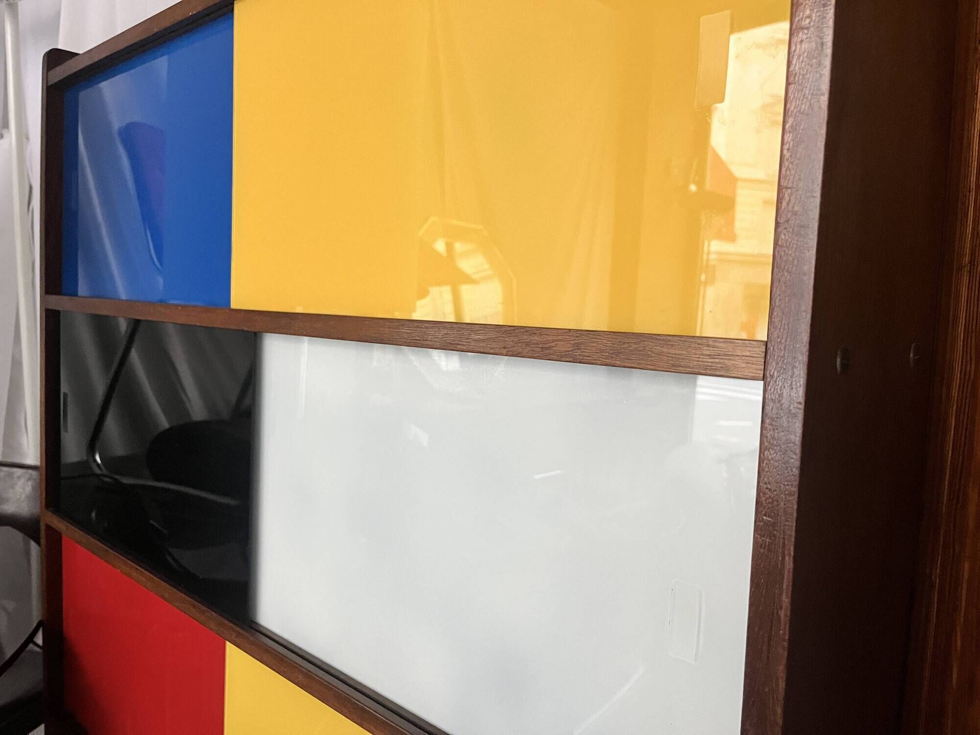 Closed bookcase in Bauhaus colors by D.Rozaffy Edition Meuble Oscar, design 1960