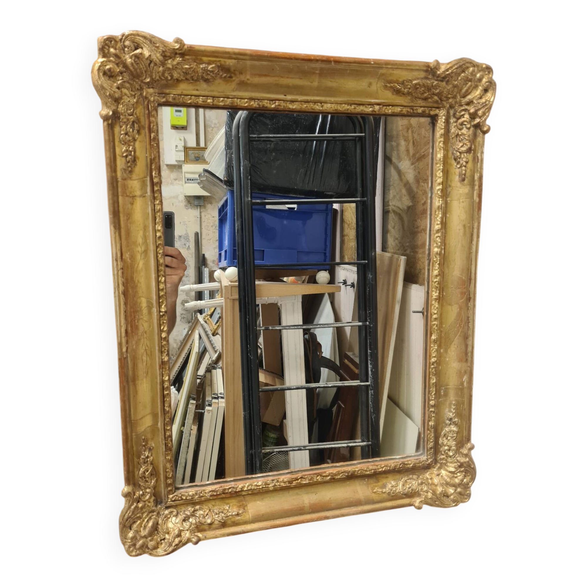 Antique gilded mirror, 19th century Empire style.