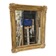 Antique gilded mirror, 19th century Empire style.