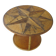 Round coffee table in bamboo, rattan, and wood with an 80s star pattern.