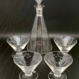 Glassware and bottle set in chiseled glass with flower motif