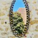 Miroir ovale en bambou et rotin, circa 1960