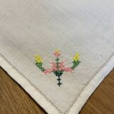 Cotton napkin edged by hand with flowers, France