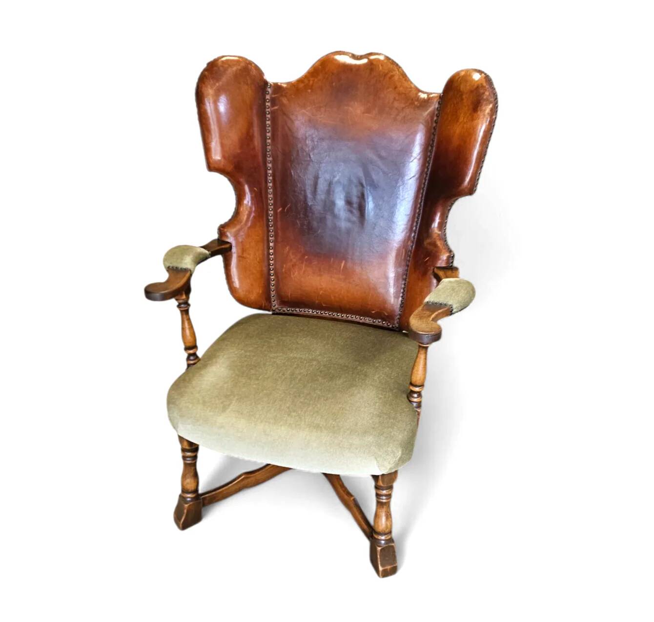 Rare leather and oak wing chair designed by Theo Ruth for Artifort / f 297 from 1949