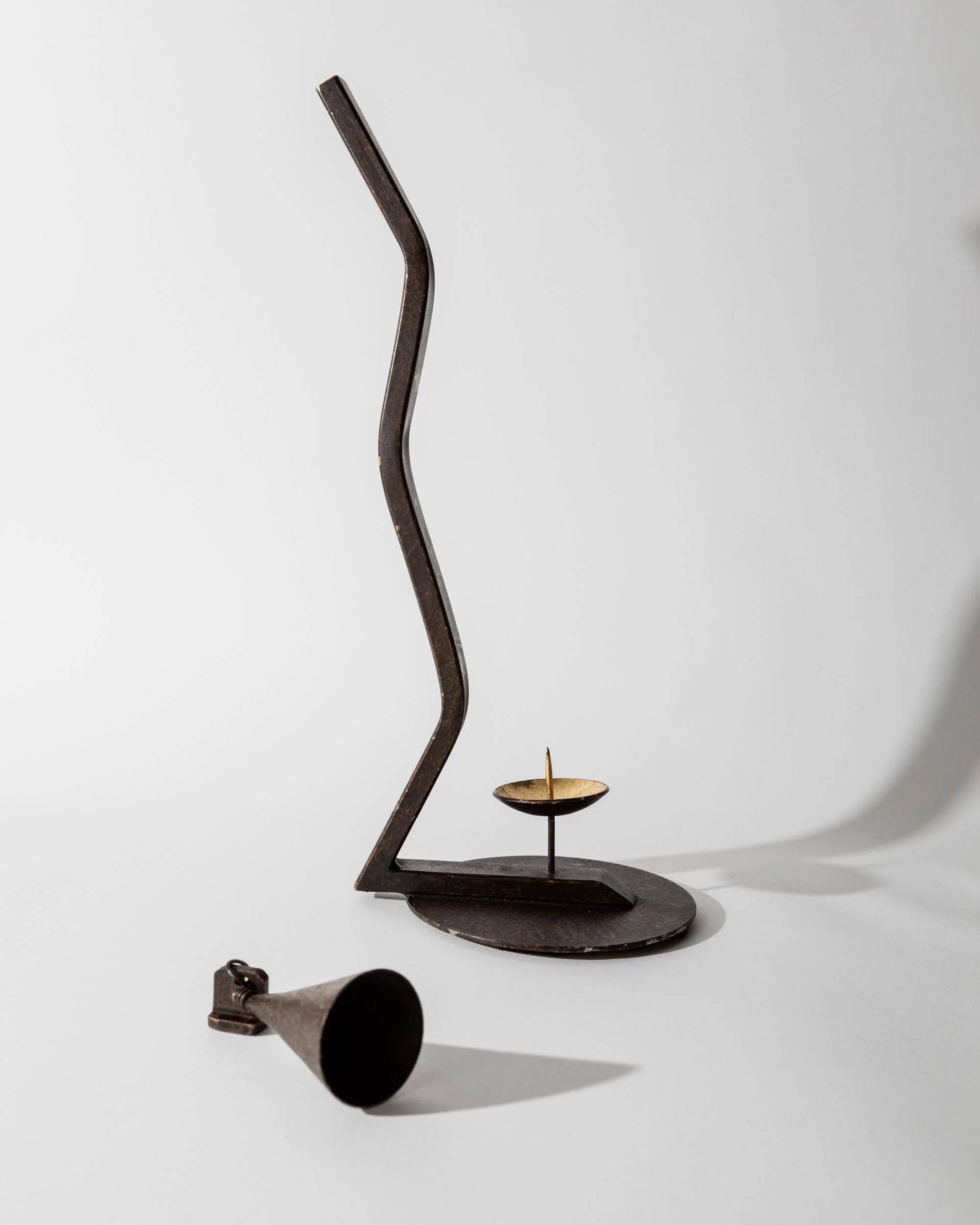 Vintage wrought iron candlestick from the 1960s, zigzag design with removable snuffer.