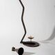 Vintage wrought iron candlestick from the 1960s, zigzag design with removable snuffer.