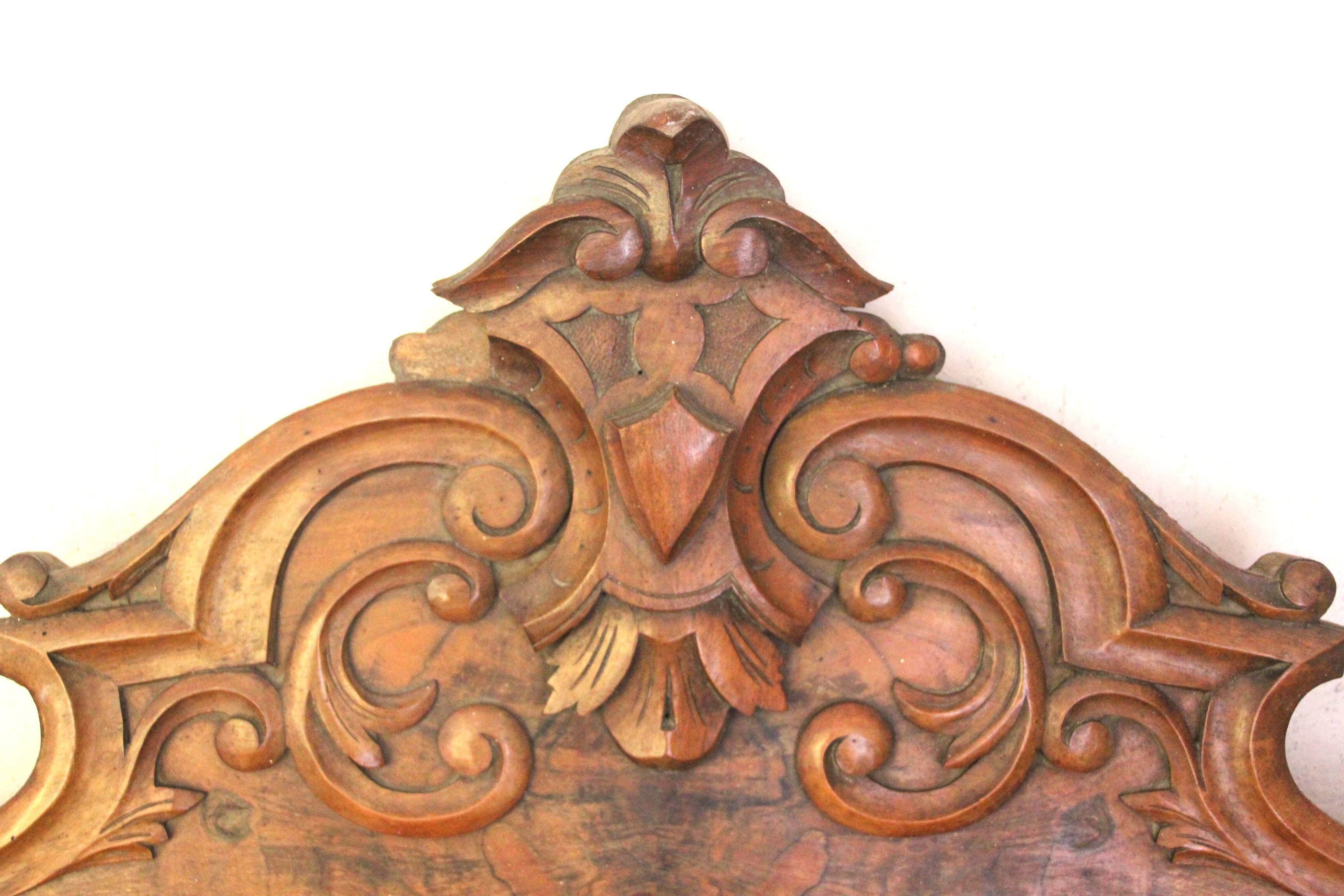 Old pediment in solid and marquetry wood
