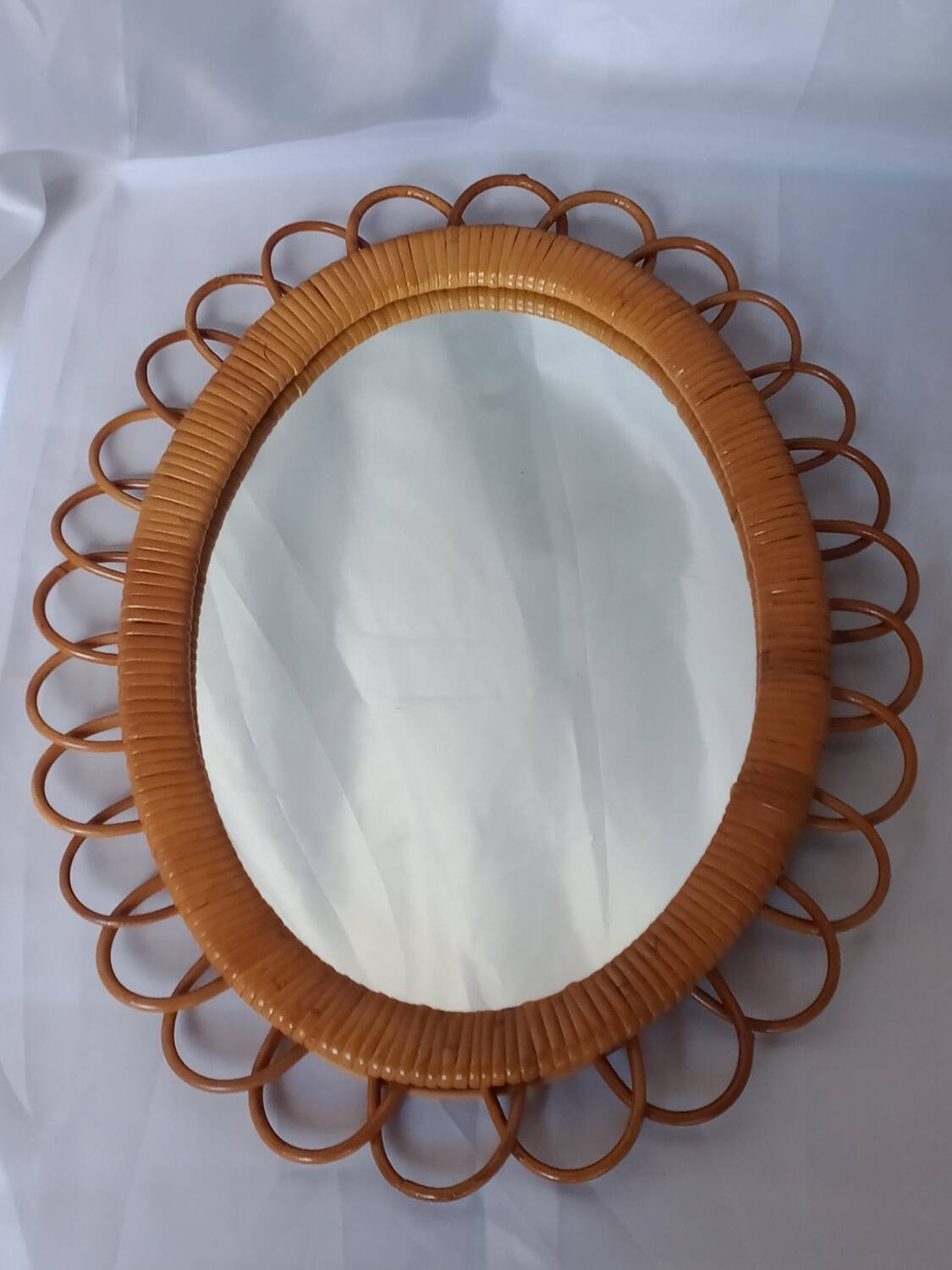 Oval rattan mirror from the 70s