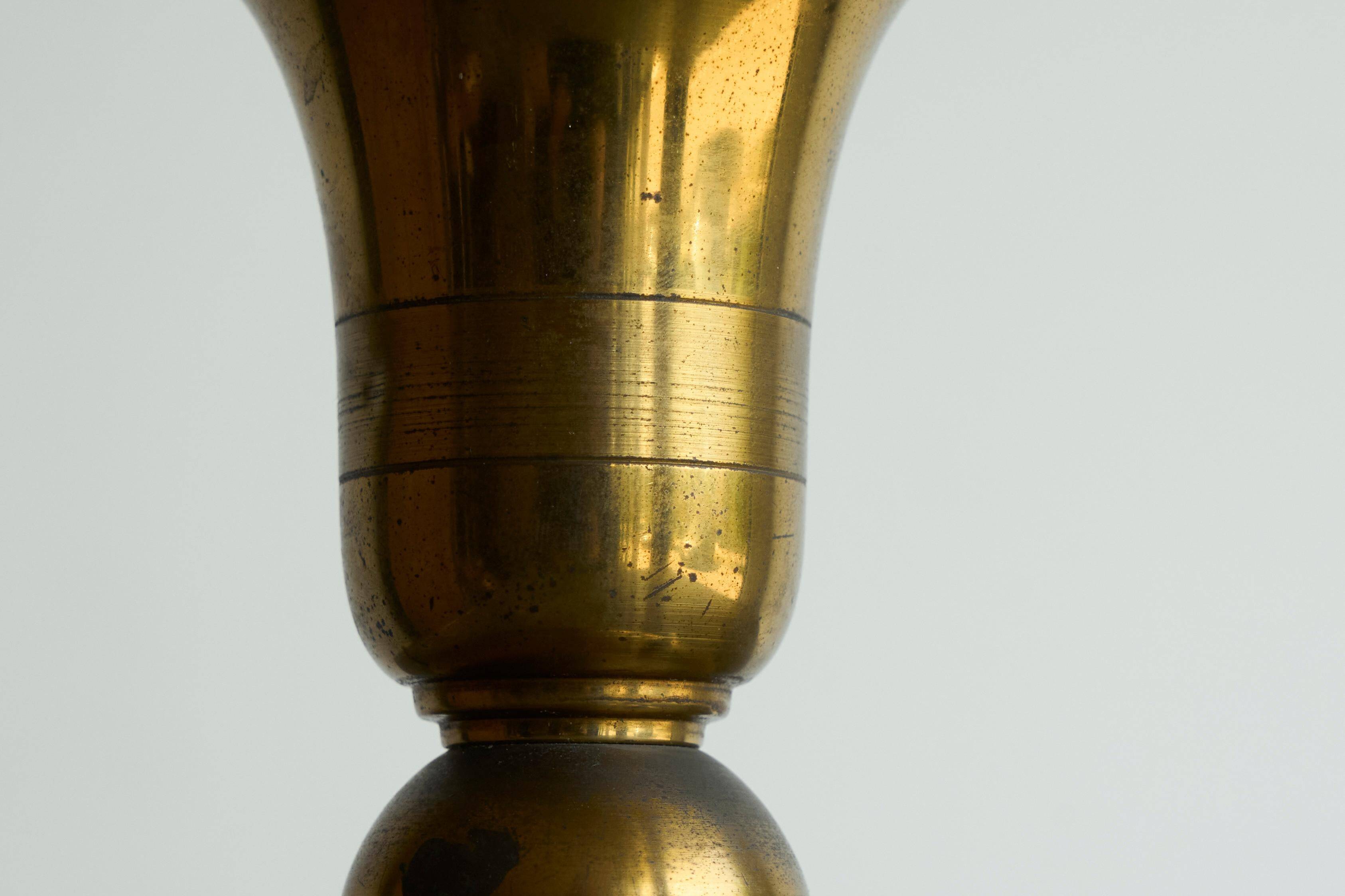 Art Deco table lamp in patinated brass from the 1940s.
