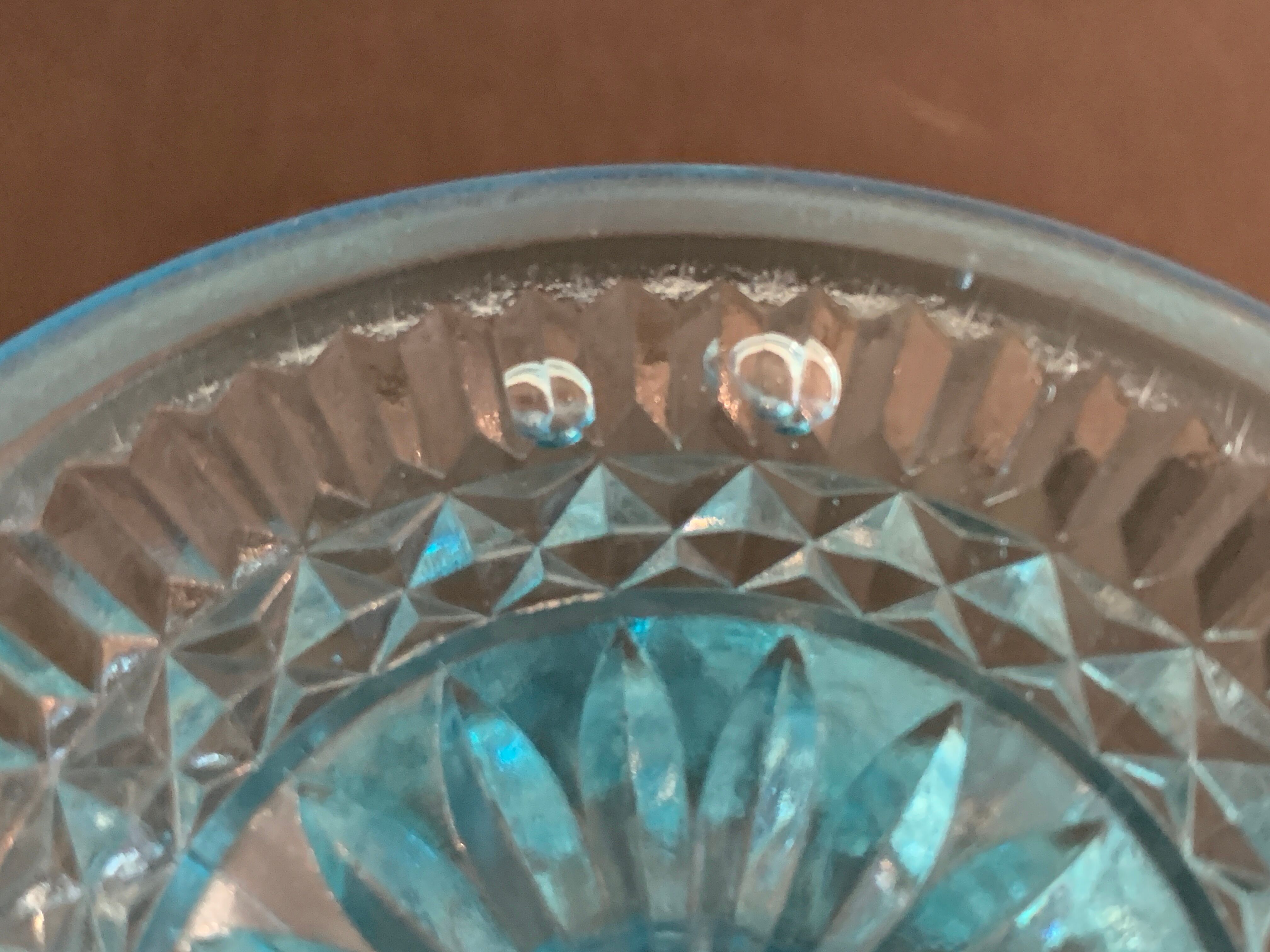 Fruit cup on blue-bubbled glass peder