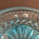 Fruit cup on blue-bubbled glass peder